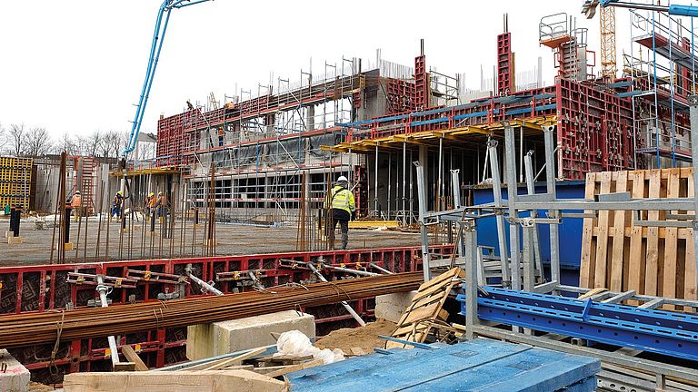 The construction area with reinforcements and formwork for filling the concrete. 